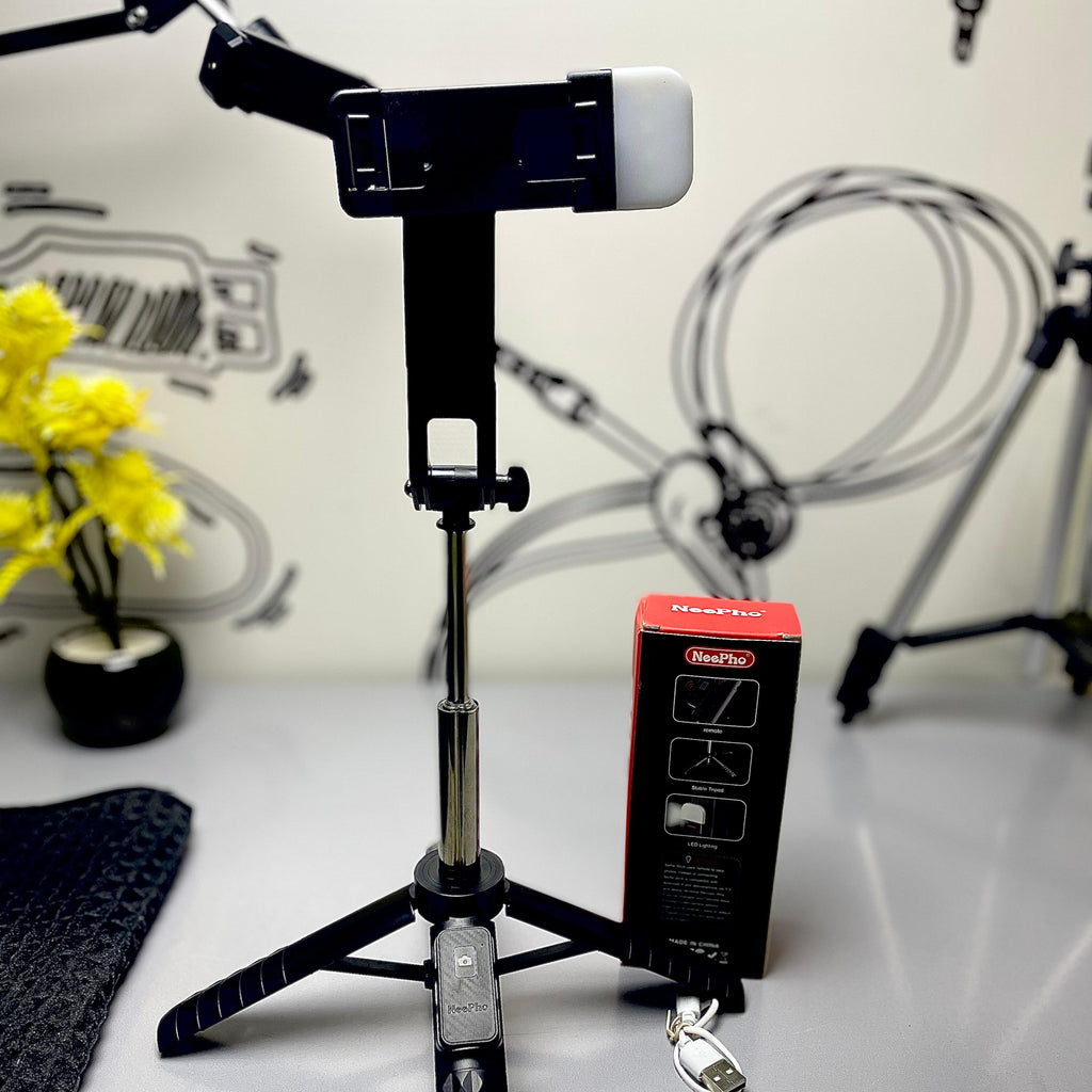 NP-L8S Mini Selfie Stick with a built-in tripod stand and LED fill light